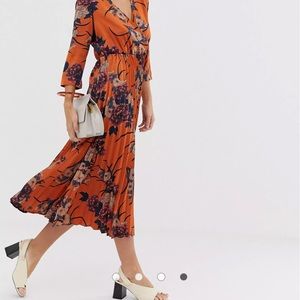 Floral wrap front dress with pleated skirt